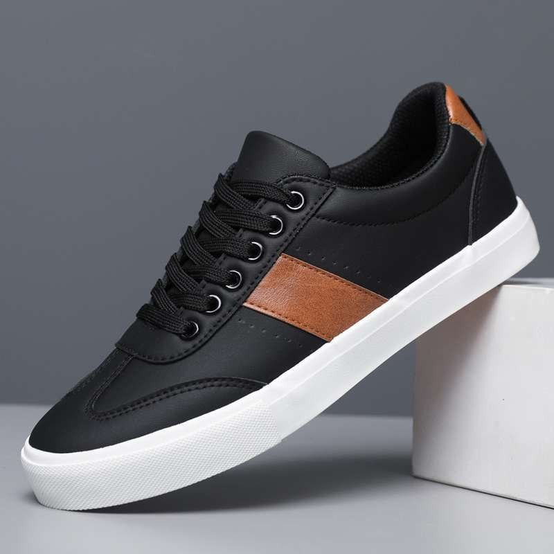 Koonexy white sneakers with black stripe & rubber sole.